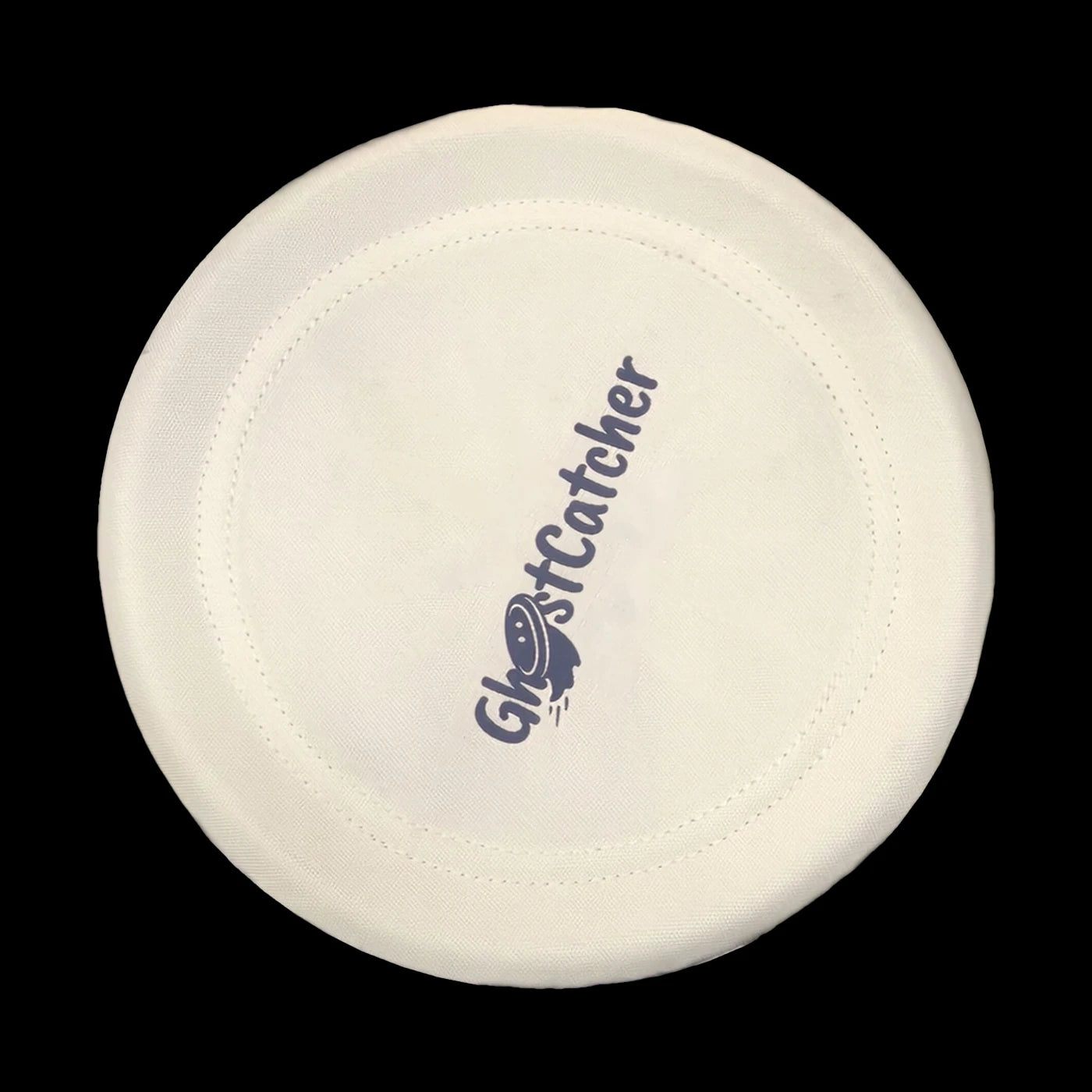GHOSTCATCHER woven-fabric dog disc, ivory with stitched ring and navy GHOSTCATCHER logo, seen from above