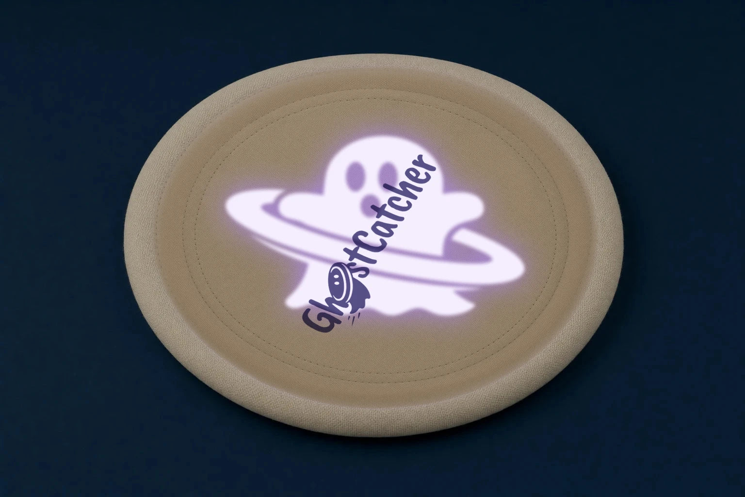 The same disc as a dog sees it: a hidden UV ghost glowing behind the logo on the woven top face